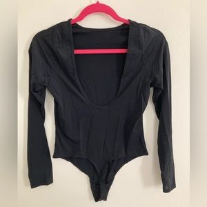 Parade low back dream fit bodysuit w/ long sleeves in “Eightball” black, size S